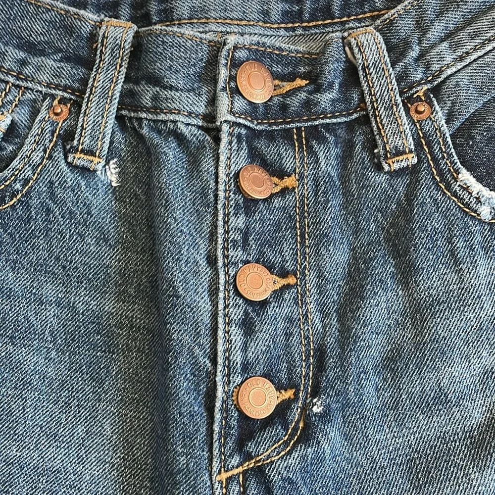 Old Navy super distressed high rise, straight leg, button fly jeans. Girls 14